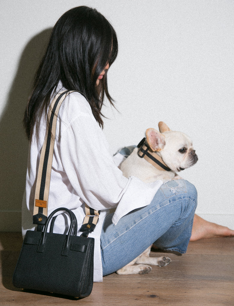 girl with french bulldog ysl bag with straps