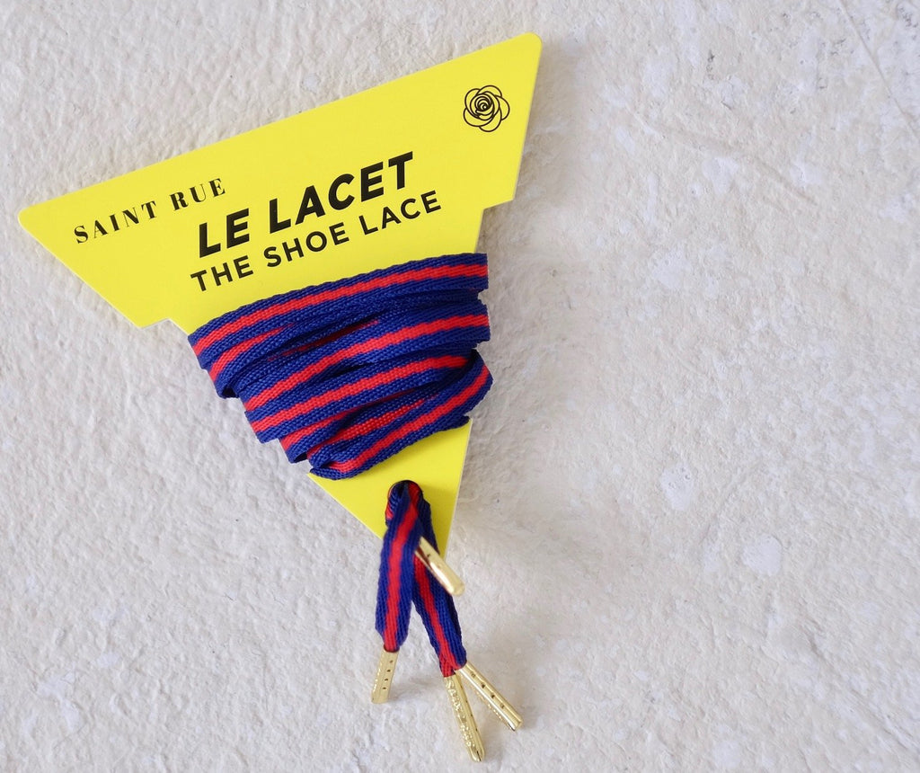 red blue shoelaces with gold tips