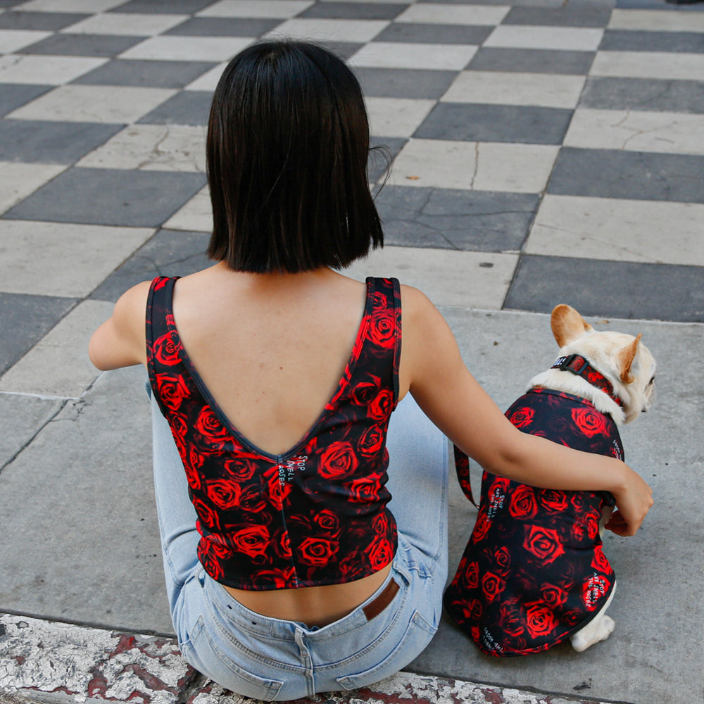 woman and french bulldog in city wearing red rose tank top and red rose dog tank